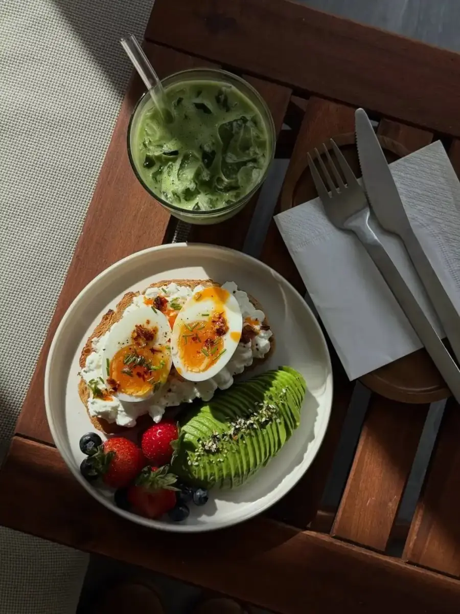 Tuesday breakfast: egg toast with ricotta, half an avocado, berries, and matcha